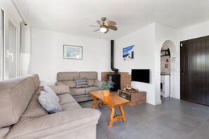 TV, fireplace, DVD player, stereo - Beautiful Apartment "La Gardenia 41" with Wi-Fi, Pool, Terrace & Garden; Street Parking Available (Es Castell)