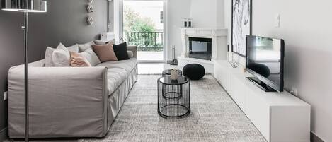 Apartment, 2 Bedrooms | Living area | 43-inch Smart TV with satellite channels, TV, Netflix