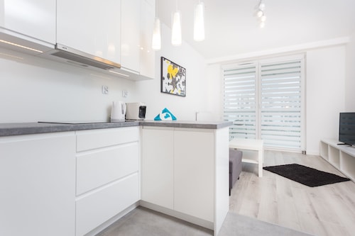 インポイント タウロン アリーナ アパートメント