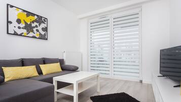 Comfort Apartment | Living area | TV