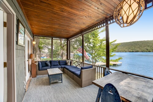 Unique & charming lakefront home with screened-in patio