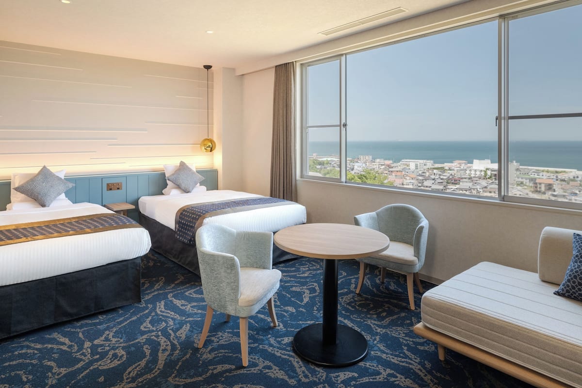 Universal Room, Non Smoking, Ocean View (with Private Bathroom) | 1 bedroom, in-room safe, bed sheets