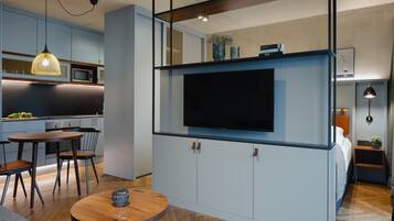 43-inch flat-screen TV with cable channels, TV