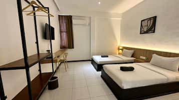 Deluxe Twin Room | Meja, seterika/papan seterika, Wi-fi percuma, cadar katil