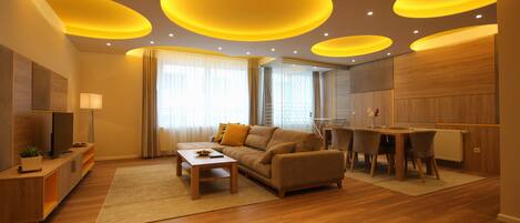 Appartement Exécutif, 2 chambres | Salle de séjour | Télévision à écran plat