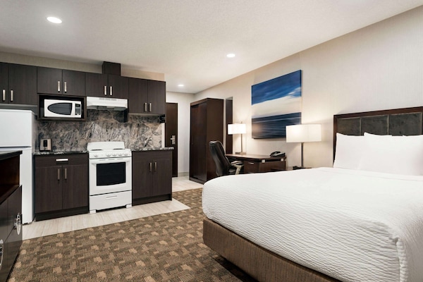 Individually furnished, desk, laptop workspace, iron/ironing board