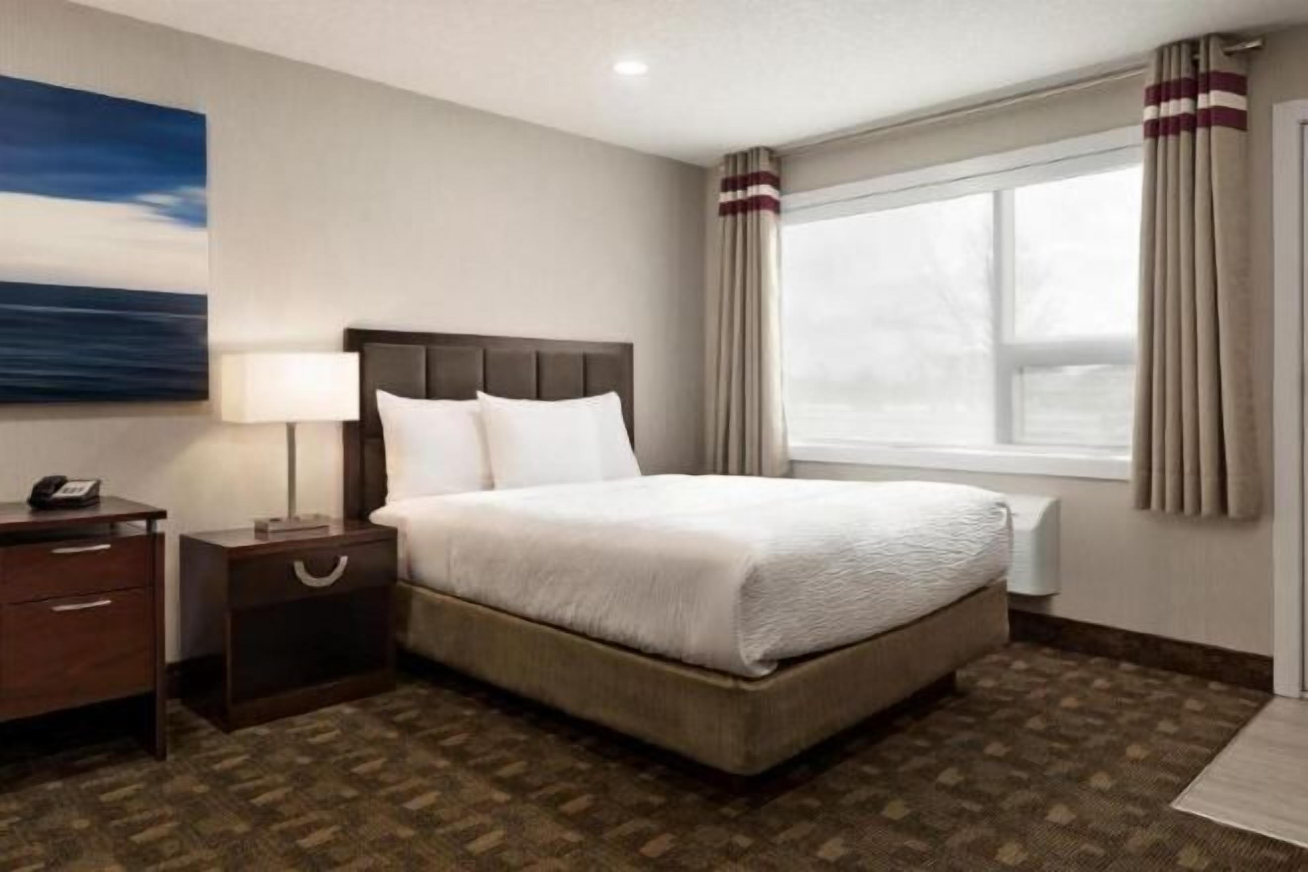 Individually furnished, desk, laptop workspace, iron/ironing board