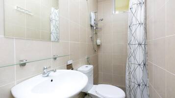 Shower, towels, soap, shampoo