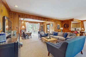 TV, fireplace, books