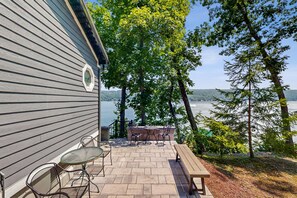 Outdoor dining - Delightful lakefront house with furnished deck, balcony, and private dock (Penn Yan)