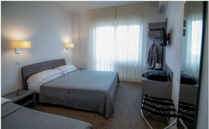 Triple Room, Balcony, Sea View | In-room safe, desk, iron/ironing board, free cribs/infant beds - Hotel Caraibi (Cervia)