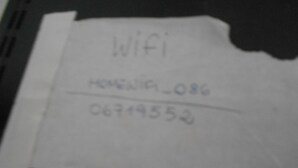 A piece of paper with the text "WiFi" and a partial IP address. - Gohouse - Suite Tonelero 06 (Rio de Janeiro)