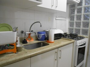 Apartamento (2 Bedrooms) | Cozinha privada | Micro-ondas, cooktop, liquidificador