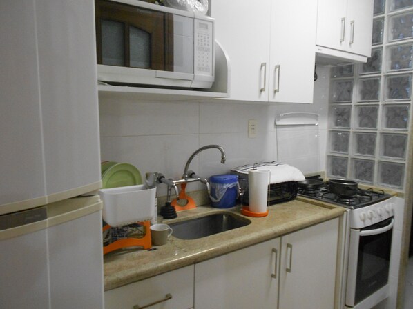 Apartamento (2 Bedrooms) | Cozinha privada | Micro-ondas, cooktop, liquidificador