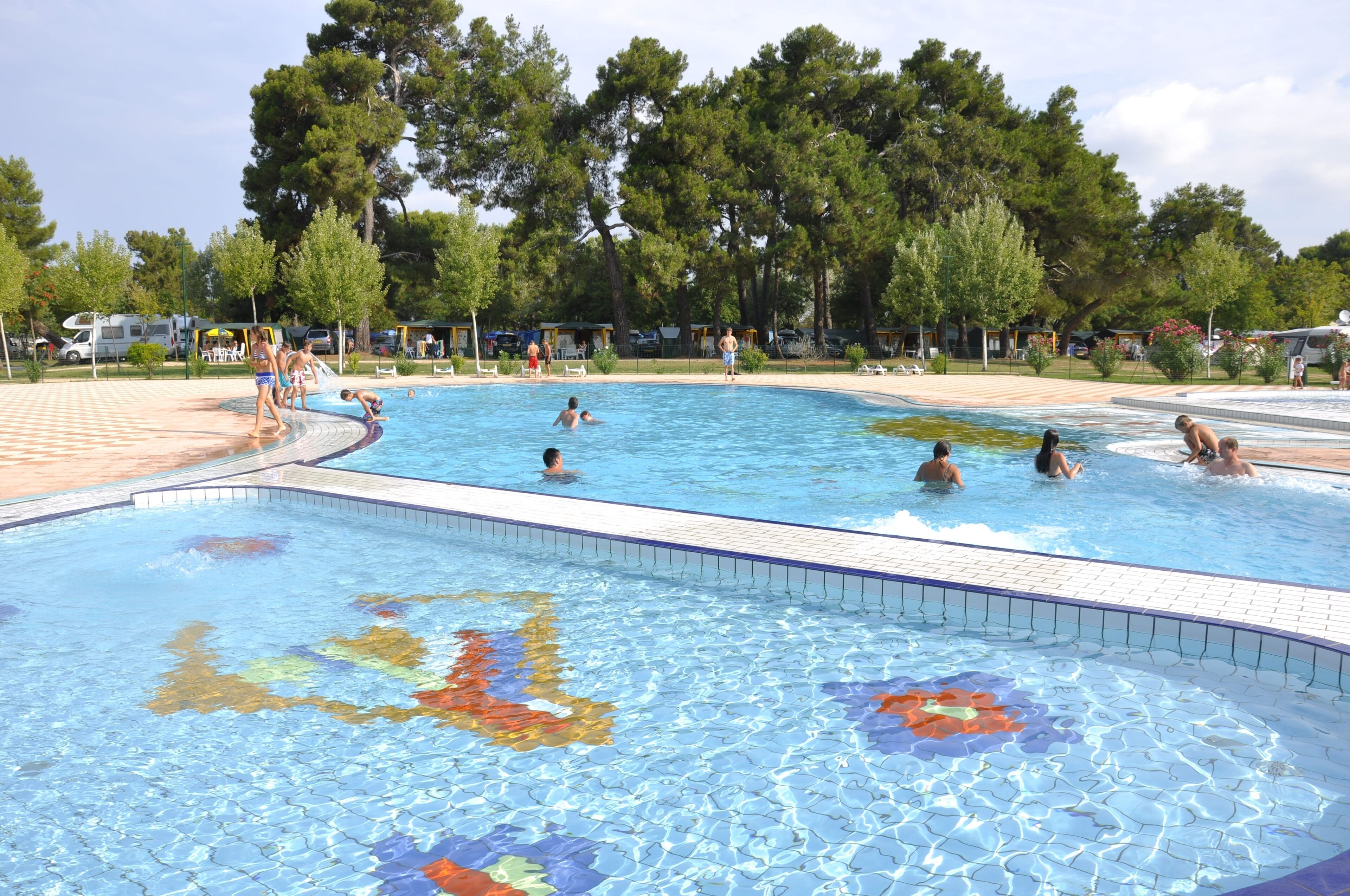 Seasonal outdoor pool, pool loungers