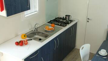 Standard Mobile Home, 2 Bedrooms | Private kitchen | Full-size fridge, stovetop, cookware/dishes/utensils