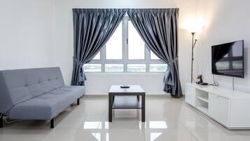 Superior Apartment, 2 Bedrooms | Living area | 40-inch flat-screen TV with cable channels, LED TV