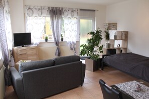 Apartamento (1-Zi-Appartment EG) | Área de estar | Smart TV