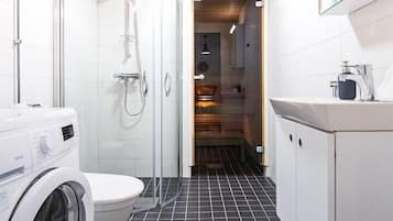 Two Room Apartment With Sauna | Bathroom | Shower, towels, toilet paper