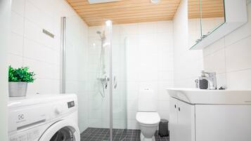 Shower, towels, toilet paper