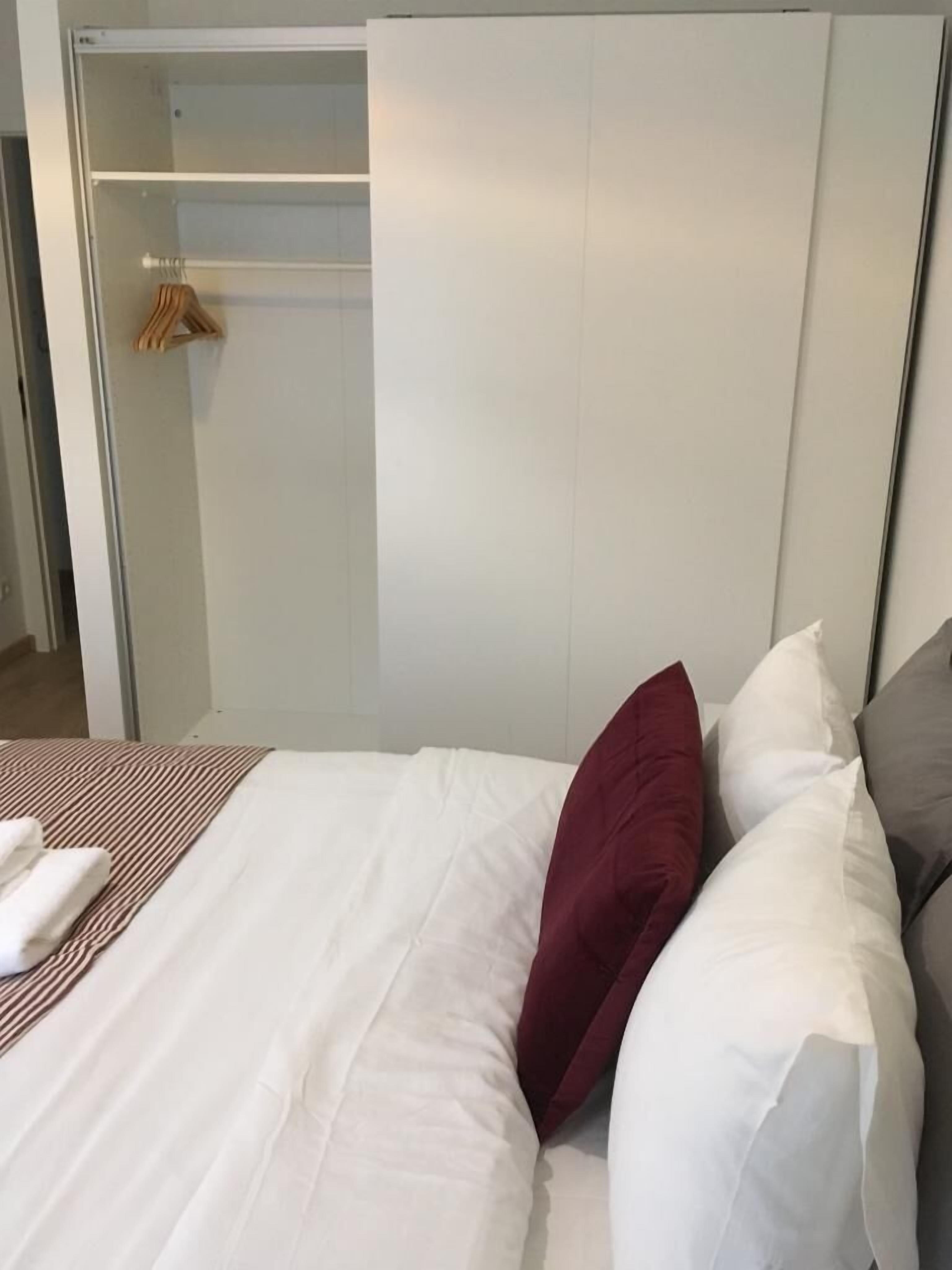 Apartamento | Tabla de planchar con plancha, wifi gratis, ropa de cama