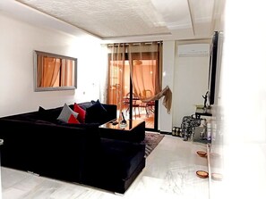 Deluxe Apartment | Living area | Flat-screen TV - Résidence Harmony (Marrakech)