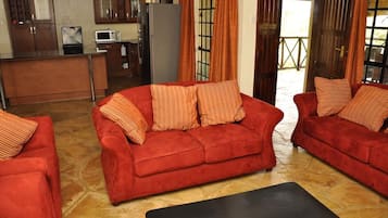 Ferienhaus | Wohnzimmer | 32-Zoll-Flachbildfernseher mit Digitalempfang, Fernseher