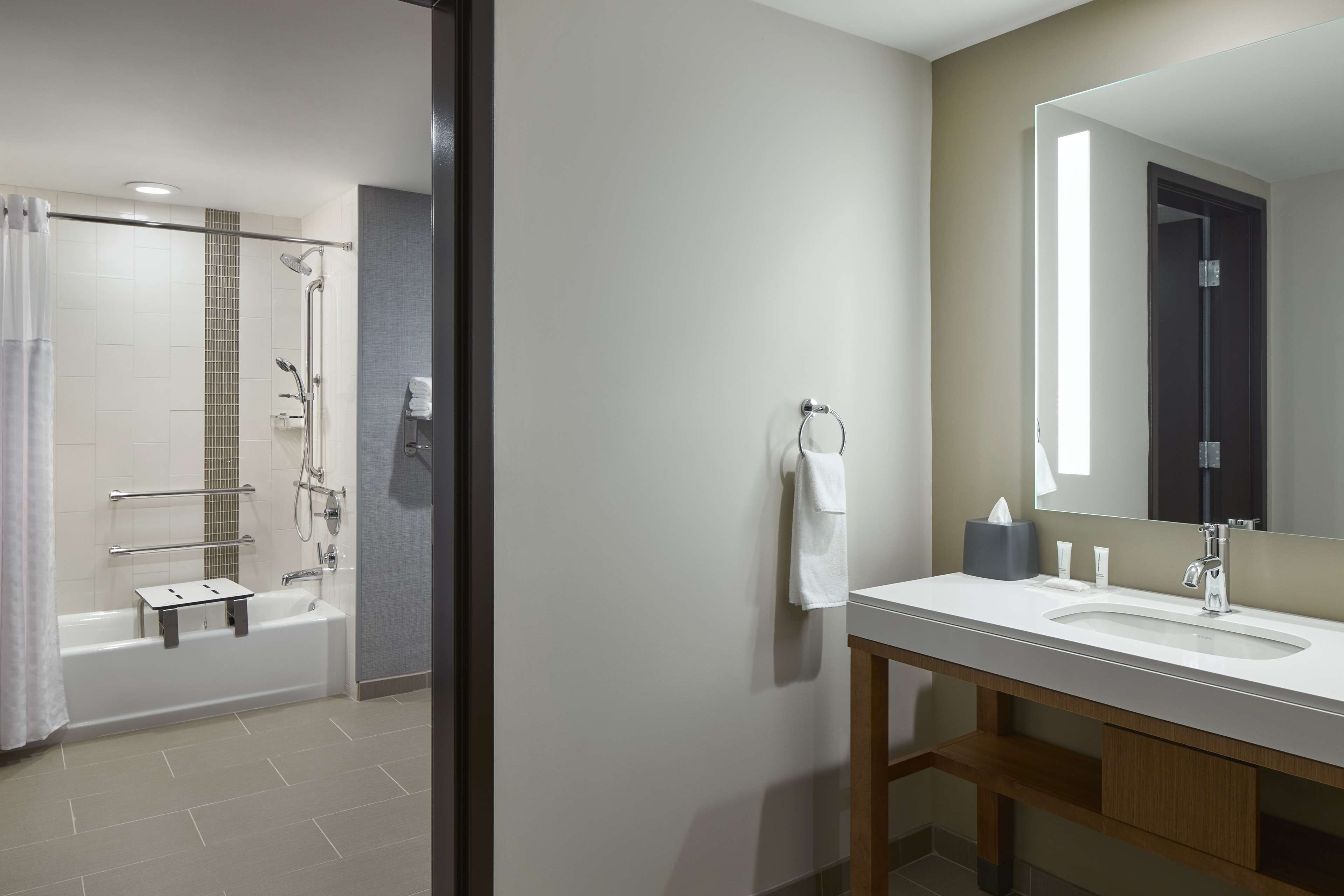 room, accessible, bathtub (2 queen beds and 1 sofa bed) | bathroom | designer toiletries, hair dryer, towels