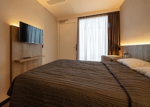 Kamar Single Comfort | Didekorasi berbeda-beda dan dilengkapi dengan perabotan berbeda-beda