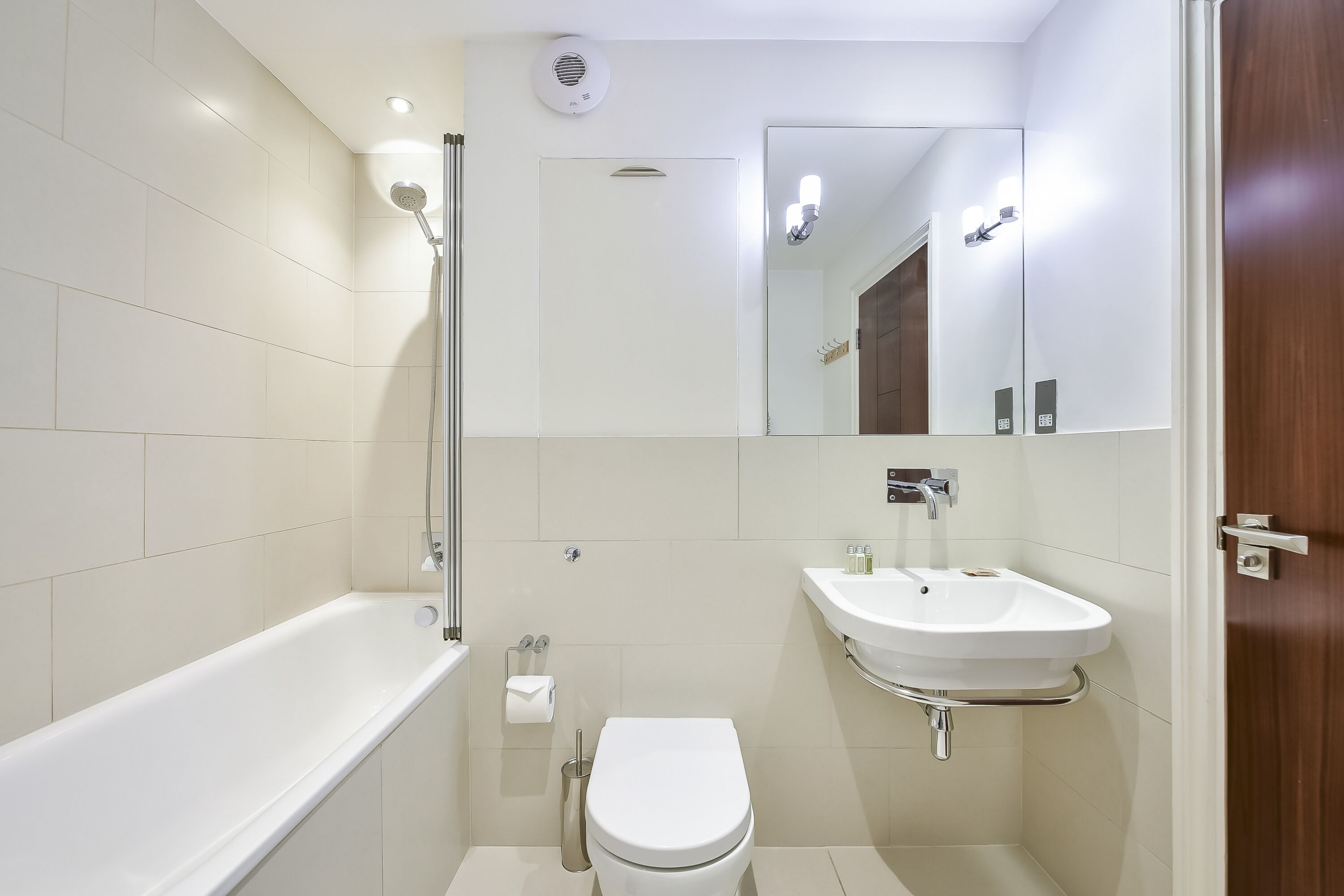 Combined shower/bathtub, hair dryer, towels, soap