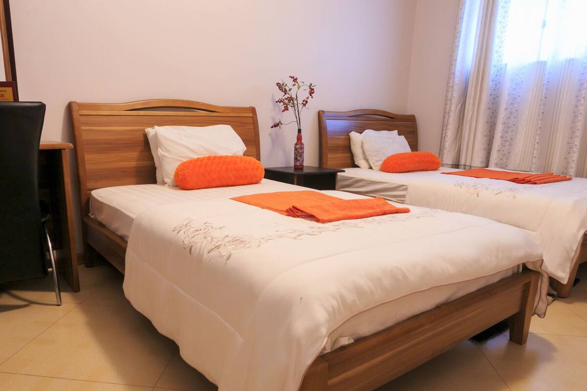 Twin Room | Hypo-allergenic bedding, minibar, individually decorated, desk