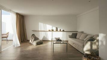 Appartement Deluxe (04) | Coin séjour | TV connectée