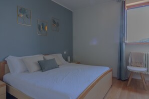 2 slaapkamers, een strijkplank/strijkijzer, gratis wifi, beddengoed