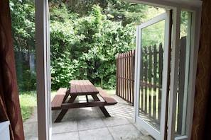 Enjoy an outdoor space with a picnic table and garden views.