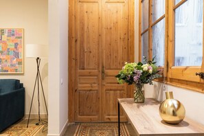 Family Apartment | Living area | 40-inch flat-screen TV with digital channels, TV - Aspasios Gracia Apartments (Barcelona)