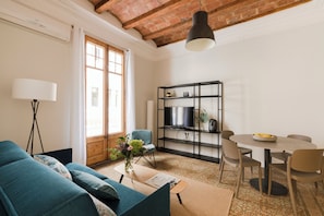 Design Apartment | Living area | 40-inch flat-screen TV with digital channels, TV - Aspasios Gracia Apartments (Barcelona)