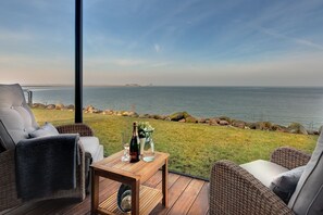 Property grounds - Port Side: unobstructed views of the Baltic Sea, fireplace and sauna for a vacation in a class of its own (Olpenitz)