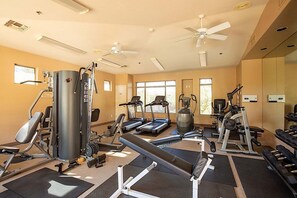 A gym with treadmills, weight machines, and a bench press. - Reduced Rates Just Posted! Cachet Condo (Scottsdale)