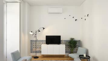 Standard Apartment, 1 Bedroom | Living area | Flat-screen TV