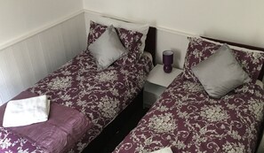 Apartamento, 2 quartos | Ferros/tábuas de passar roupa, Wi-Fi de cortesia, roupa de cama