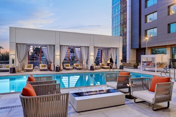 Outdoor pool, cabanas (surcharge), pool umbrellas at JW Marriott Anaheim Resort