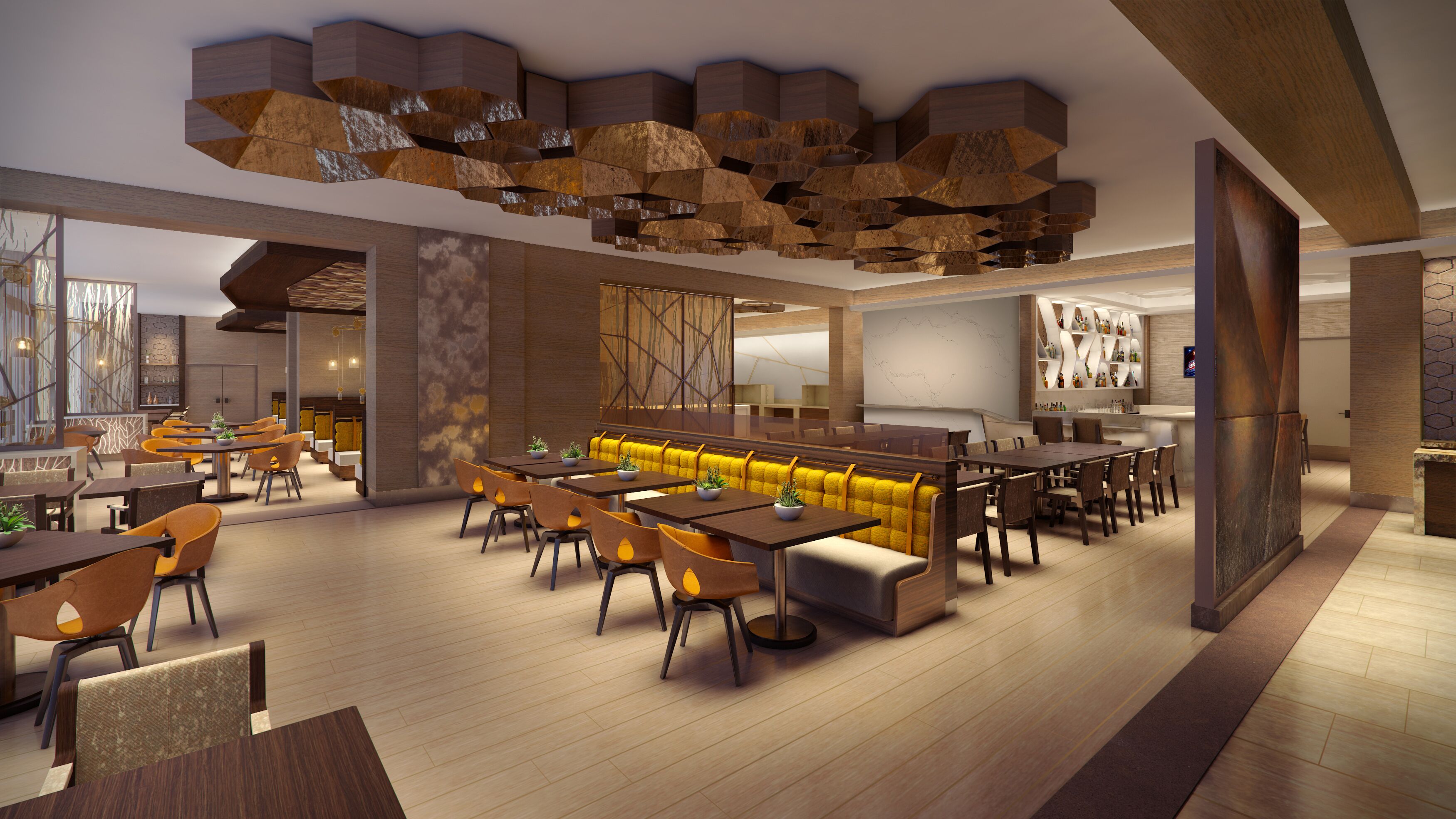 A modern restaurant with a long communal dining table, individual tables, and yellow cushioned seating.