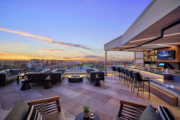 3 bars/lounges, lobby lounge, rooftop bar