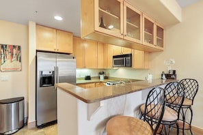 Microwave, stovetop, dishwasher, coffee/tea maker