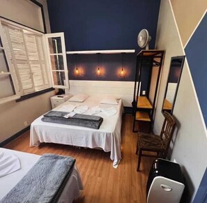 Quarto solteiro standard | Roupas de cama antialérgicas, frigobar, Wi-Fi de cortesia, roupa de cama