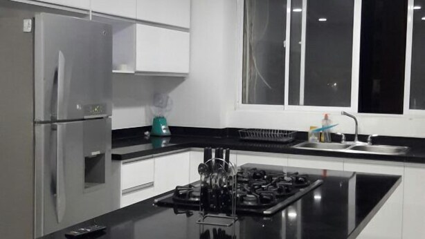 Family Apartment | Living area | 42-inch LCD TV with cable channels, TV - Apartahotel El Dorado (Santa Marta)