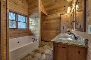 Bathtub, hair dryer, towels