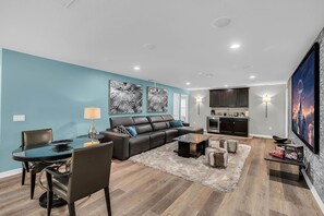 TV, video games, DVD player, foosball