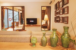 Deluxe Villa, 1 Bedroom, Private Pool | Living area | LCD TV