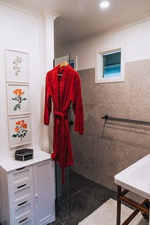 Shower, hair dryer, towels, soap